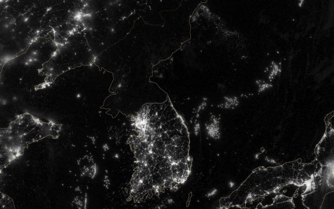 North Korea says readying satellite, suggesting long-range missile launch