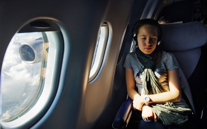 Headphones, Alcohol, and 'No-Child Zones': Flyers Reveal Their Favorite Airplane Amenities