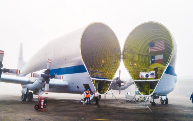 NASA transports its Mars crew capsule in the belly of a really weird cargo plane